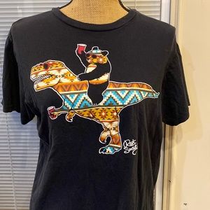 Panda on a dinosaur shirt